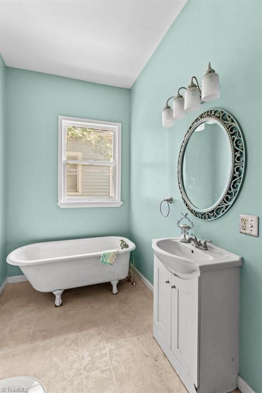 524 Horah St, Salisbury, NC 28144 - full bath with vanity and a freestanding tub