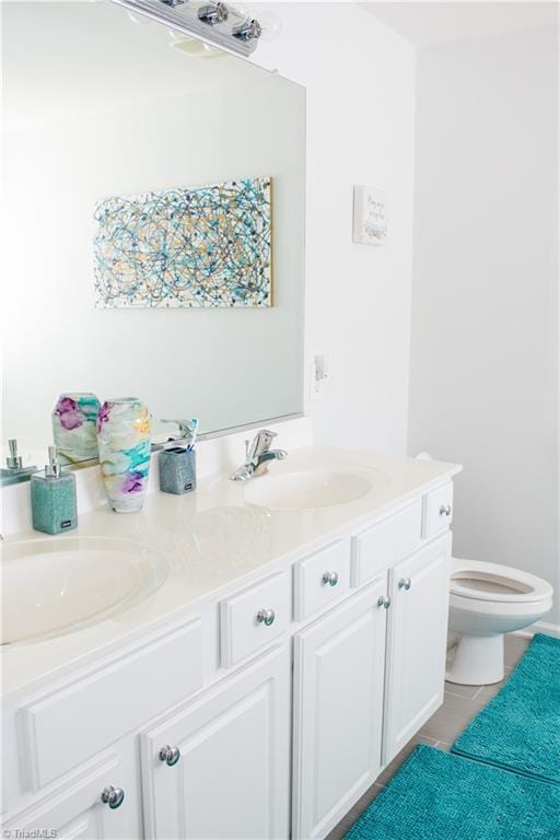 3029 Zacharys Keep Ct, Winston-Salem, NC 27103 - bathroom with double vanity and tile patterned floors