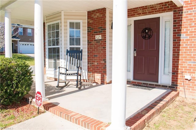 3029 Zacharys Keep Ct, Winston-Salem, NC 27103 - view of exterior entry with brick siding and covered porch