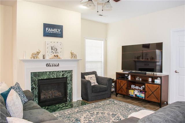 3029 Zacharys Keep Ct, Winston-Salem, NC 27103 - living room featuring a ceiling fan, tile patterned floors, and a fireplace