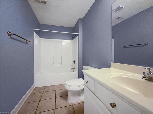 full bathroom featuring  shower combination, a textured ceiling, toilet, vanity, and tile patterned flooring