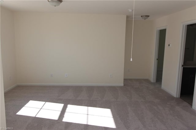 spare room with carpet flooring