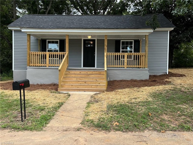 bungalow-style house featuring covered porch