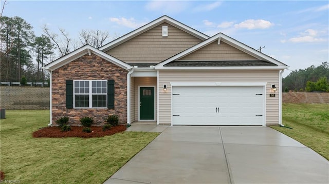 craftsman inspired home with a garage and a front yard