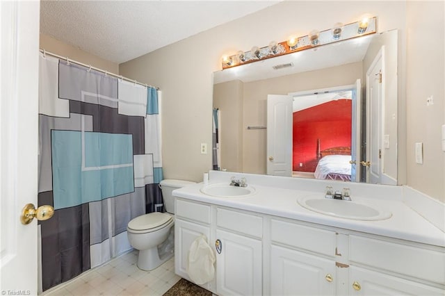 3902 Elizabeth Glen Way, Jamestown, NC 27282 - full bathroom featuring double vanity, toilet, connected bathroom, and a shower with curtain
