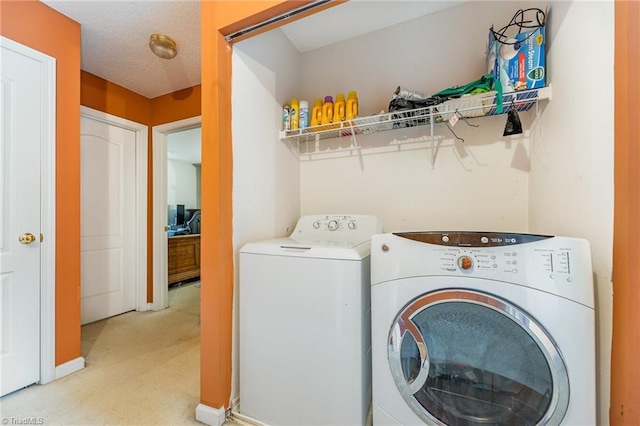 3902 Elizabeth Glen Way, Jamestown, NC 27282 - washroom with washer and clothes dryer and light colored carpet