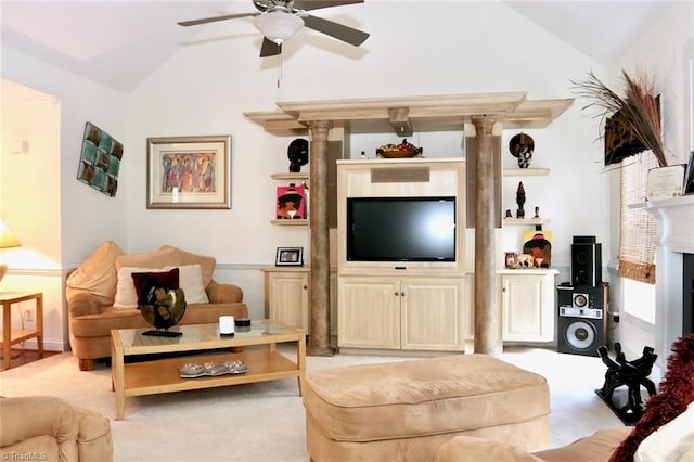 carpeted living room with vaulted ceiling and ceiling fan