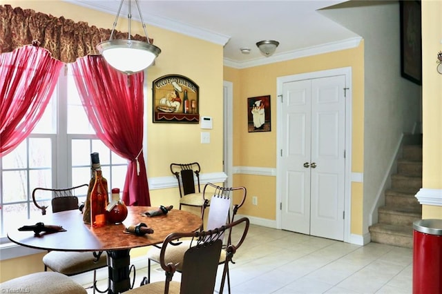 dining room featuring ornamental molding