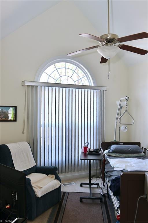 office area with vaulted ceiling and carpet floors