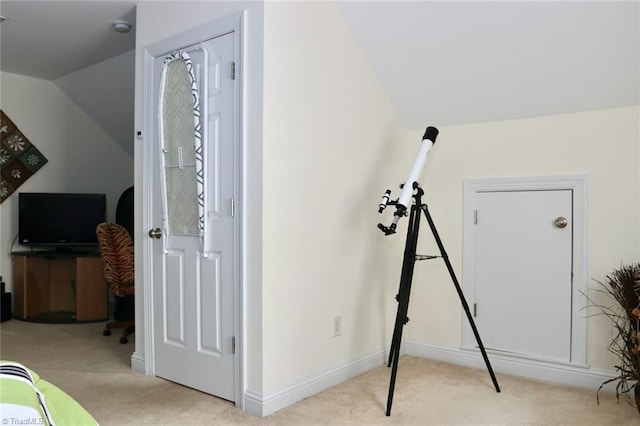 bonus room with light carpet and lofted ceiling