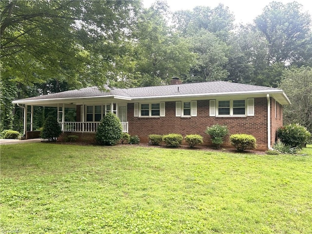 437 Charles Dr, Winston-Salem, NC 27107 - ranch-style house with a front lawn and brick siding
