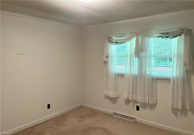 437 Charles Dr, Winston-Salem, NC 27107 - spare room featuring crown molding, carpet flooring, a textured ceiling, and baseboards
