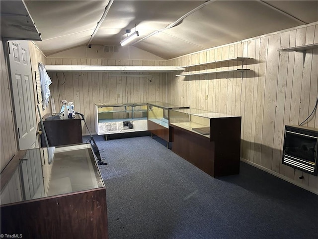 437 Charles Dr, Winston-Salem, NC 27107 - basement featuring heating unit, wood walls, and carpet floors
