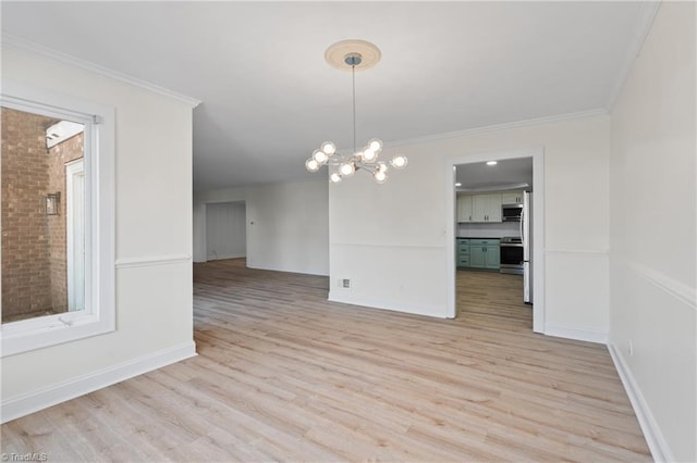 unfurnished dining area with light hardwood / wood-style floors, ornamental molding, and an inviting chandelier