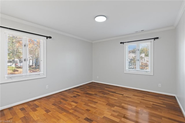 unfurnished room with crown molding and dark hardwood / wood-style floors