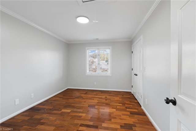 unfurnished room with dark hardwood / wood-style flooring and crown molding