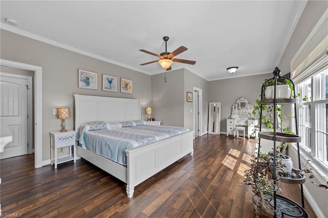 bedroom with crown molding, dark hardwood / wood-style floors, and ceiling fan