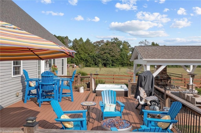 wooden deck featuring a gazebo