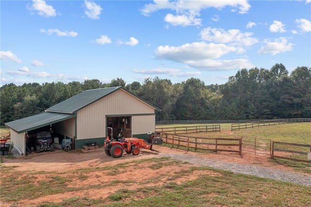 view of outdoor structure with a rural view