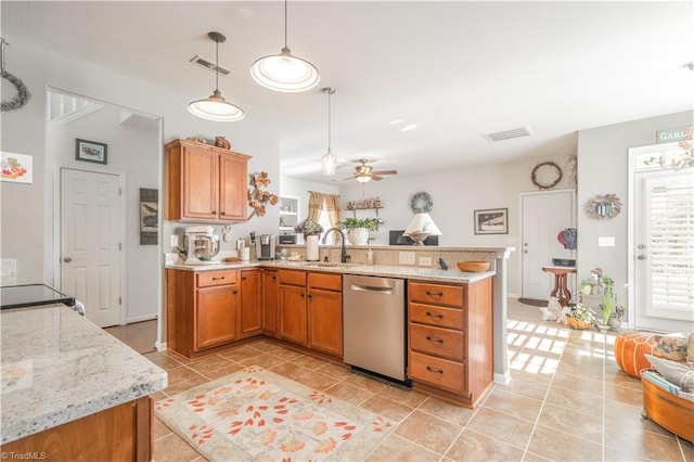 kitchen with kitchen peninsula, decorative light fixtures, sink, stainless steel dishwasher, and ceiling fan