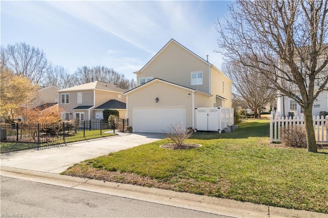 view of property with a front lawn and a garage