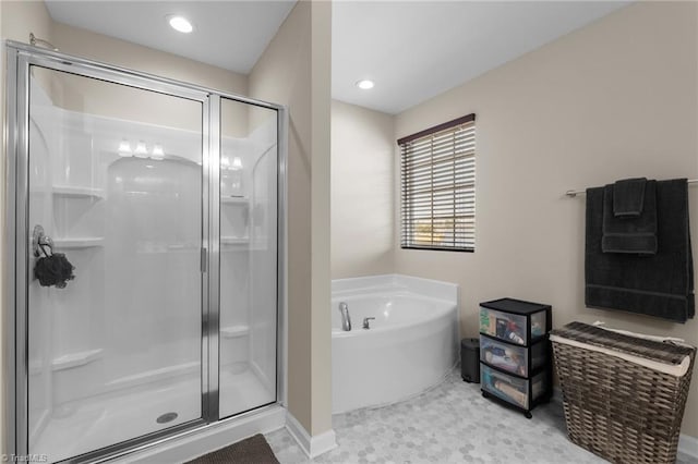 1318 Reading Ct, Burlington, NC 27217 - full bath featuring a stall shower, baseboards, a bath, and recessed lighting