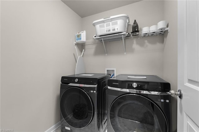 1318 Reading Ct, Burlington, NC 27217 - clothes washing area with laundry area, washer and clothes dryer, and baseboards