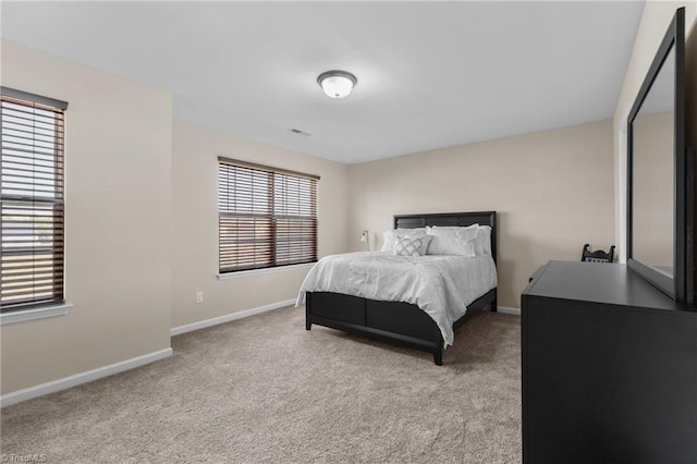 1318 Reading Ct, Burlington, NC 27217 - bedroom featuring visible vents, baseboards, and light colored carpet