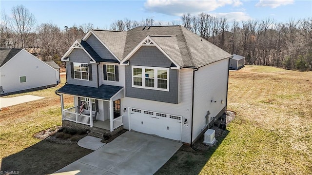 1318 Reading Ct, Burlington, NC 27217 - view of front of property with a porch, a front yard, driveway, and an attached garage