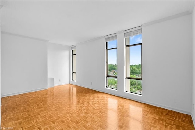 1101 N Elm St Unit 902, Greensboro, NC 27401 - spare room featuring baseboards