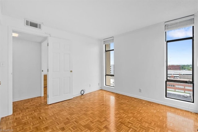 1101 N Elm St Unit 902, Greensboro, NC 27401 - unfurnished room with baseboards