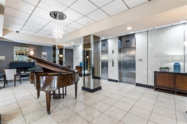 1101 N Elm St Unit 902, Greensboro, NC 27401 - building lobby with a paneled ceiling and recessed lighting