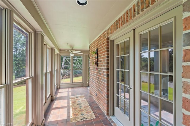 2020 La Dora Dr, High Point, NC 27265 - unfurnished sunroom with brick wall and tile patterned floors