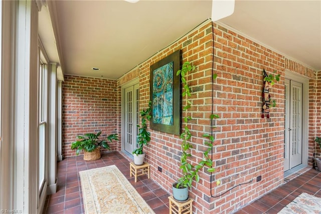 2020 La Dora Dr, High Point, NC 27265 - doorway to property featuring brick siding and covered porch