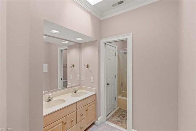 2020 La Dora Dr, High Point, NC 27265 - bathroom with crown molding, double vanity, and shower / bath combination