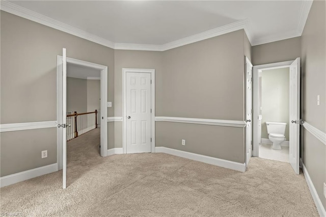 2020 La Dora Dr, High Point, NC 27265 - unfurnished bedroom featuring carpet floors, ornamental molding, and ensuite bath