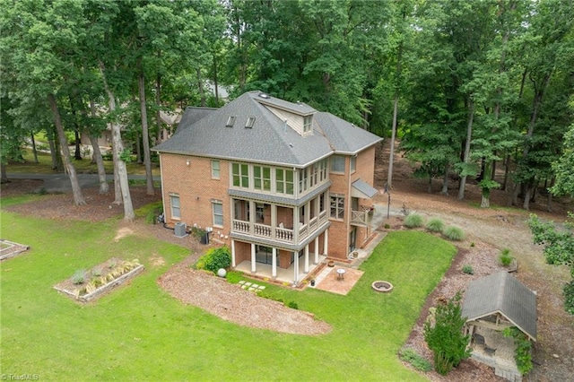 2020 La Dora Dr, High Point, NC 27265 - rear view of property with a lawn, brick siding, a patio area, and a wooden deck