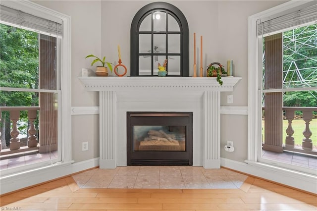 2020 La Dora Dr, High Point, NC 27265 - detailed view of wood finished floors and a glass covered fireplace