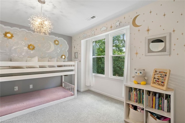 bedroom with carpet, a chandelier, baseboards, and wallpapered walls