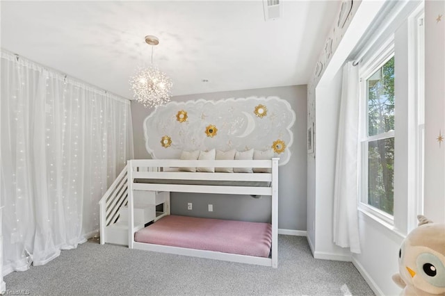 bedroom featuring carpet, a chandelier, and baseboards