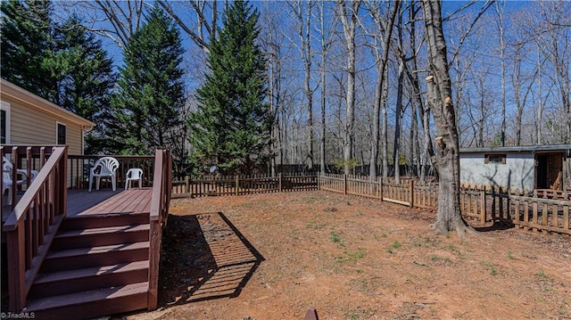 view of yard with a deck and fence private yard