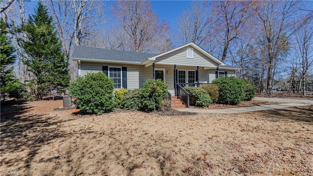 ranch-style house with covered porch