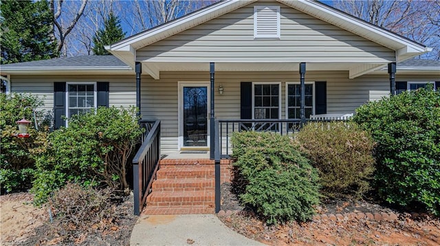 bungalow-style house featuring covered porch