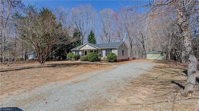 view of front of house featuring a porch and driveway