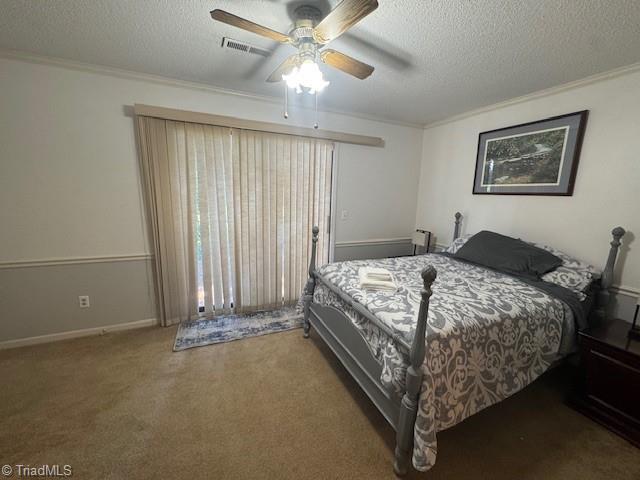 201 Olde Vineyard Ct, Winston-Salem, NC 27104 - carpeted bedroom with a textured ceiling, crown molding, and a ceiling fan