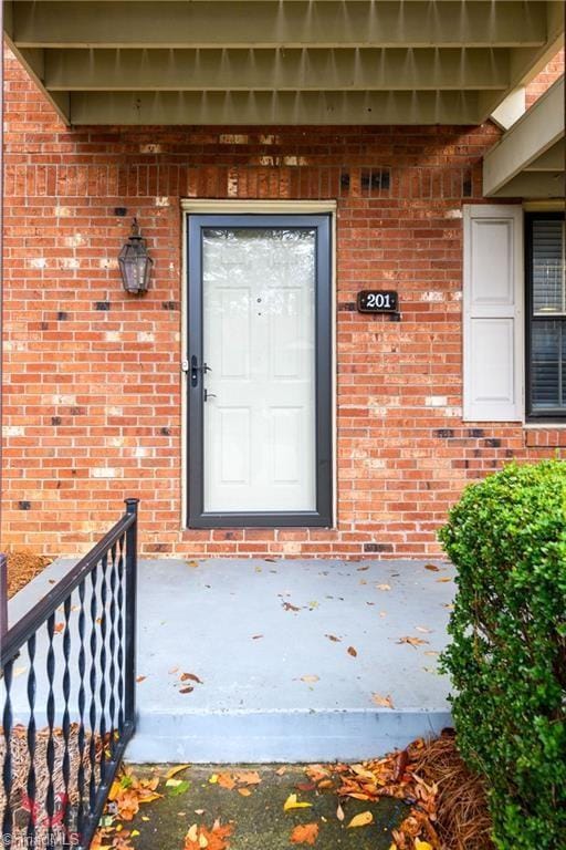 201 Olde Vineyard Ct, Winston-Salem, NC 27104 - view of exterior entry with brick siding