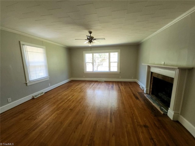 unfurnished living room with a fireplace, ornamental molding, and dark hardwood / wood-style flooring