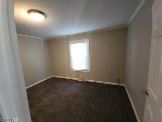 carpeted empty room with crown molding