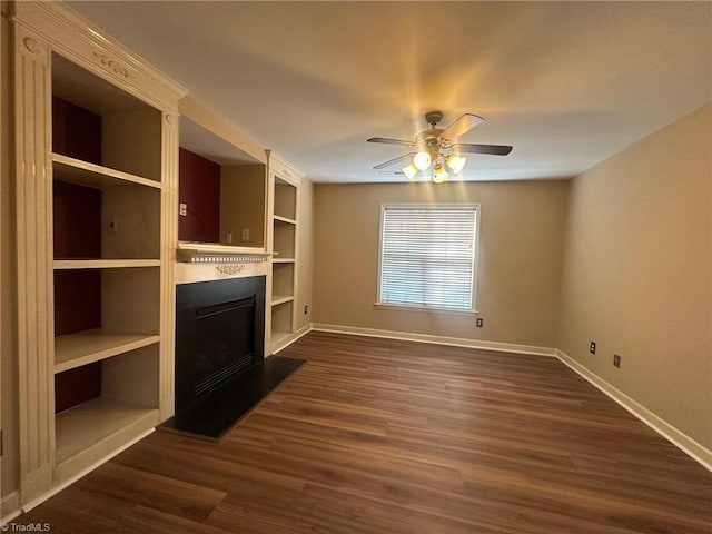 4727 Eagle Path, Winston-Salem, NC 27127 - unfurnished living room featuring a fireplace with raised hearth, baseboards, dark wood-type flooring, and ceiling fan