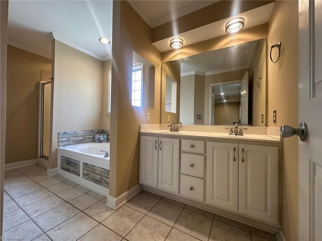 4727 Eagle Path, Winston-Salem, NC 27127 - bathroom featuring crown molding, a garden tub, double vanity, tile patterned floors, and baseboards